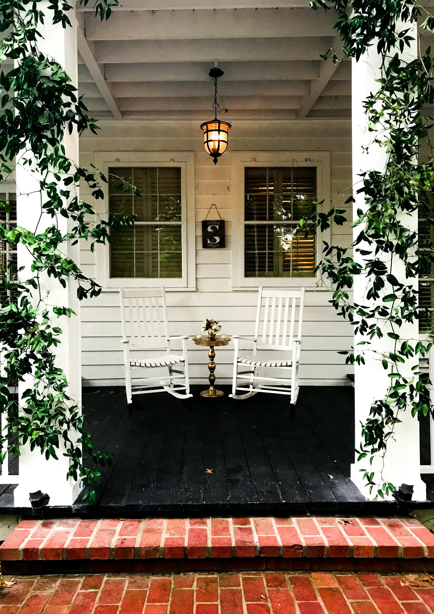 Front porch with wooden rocking chairs in Somerset County NJ – Realtor Lorraine Macaluso helping buyers and sellers find homes with comfort and charm.